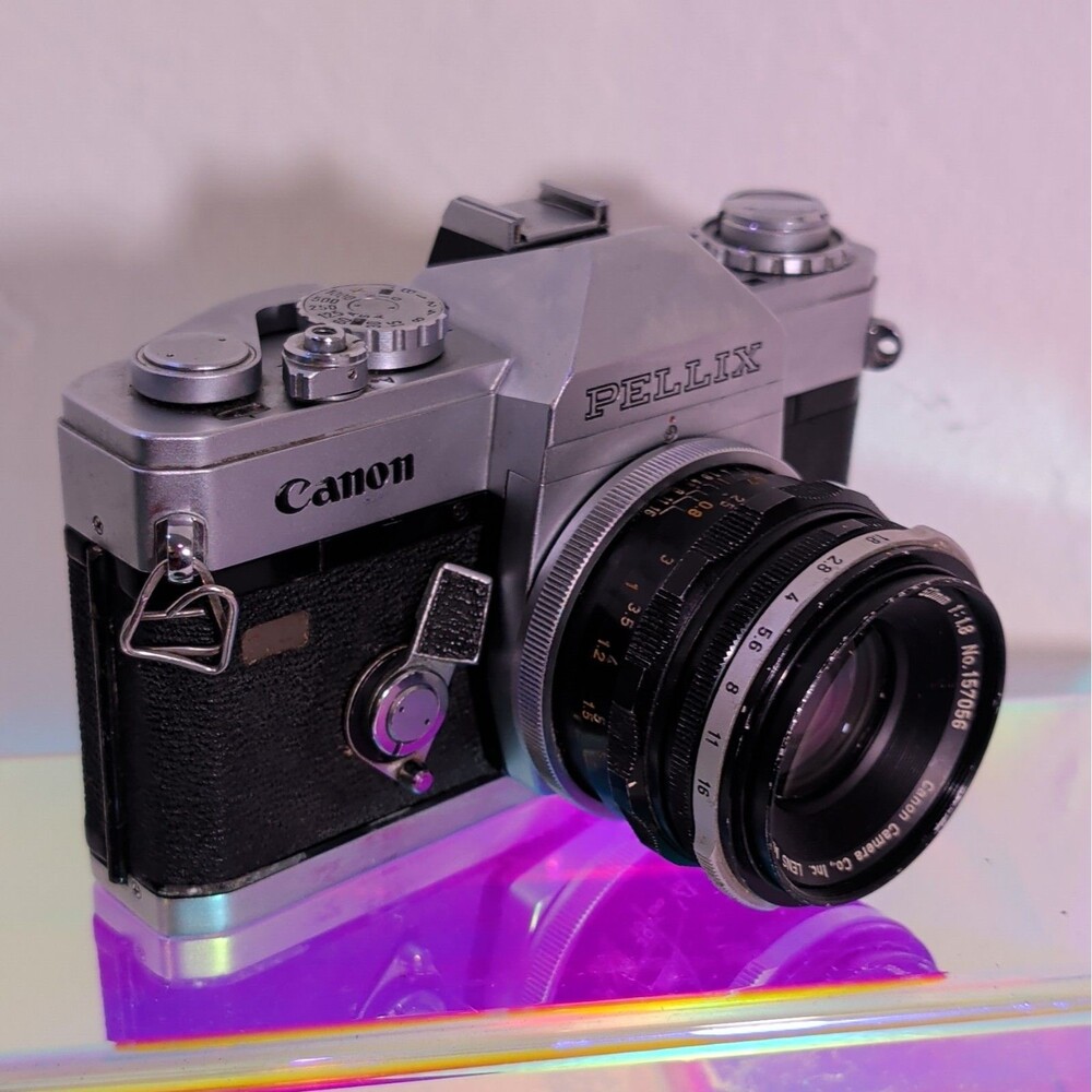 Vintage Canon Pellix 35mm SLR Film Camera w/ FL 50mm f/1.8 Lens Japan